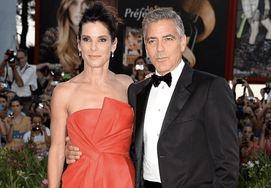 Sandra Bullock and George Clooney at the Gravity Premiere at the 2013 Venice Film Festival