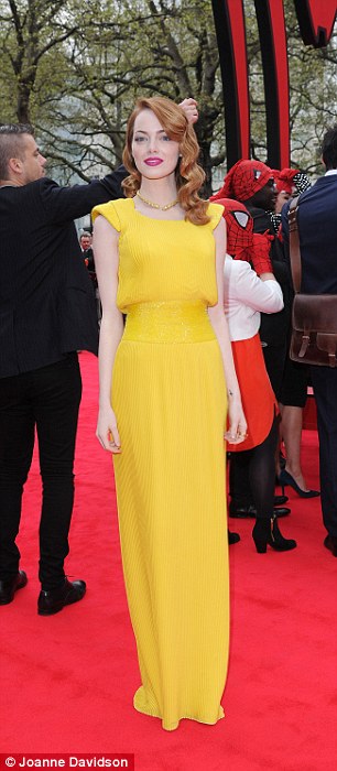 Emma Watson in marigold-yellow Atelier Versace dress with matching Swarovski crystal beading on the shoulders and waist